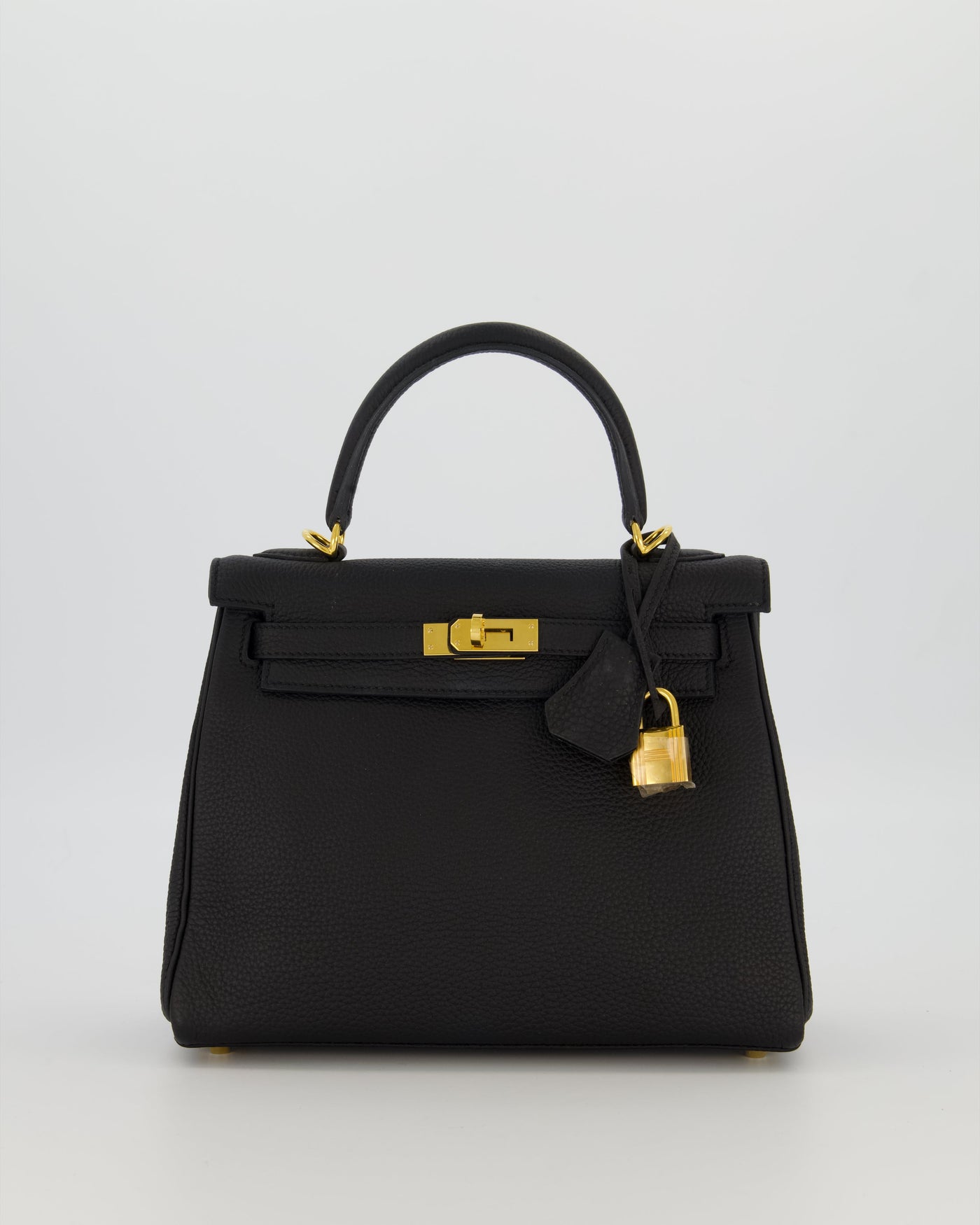 Hermes Kelly 25 Retourne Bag in Noir Togo Leather with Gold Hardware | Studio Nafay