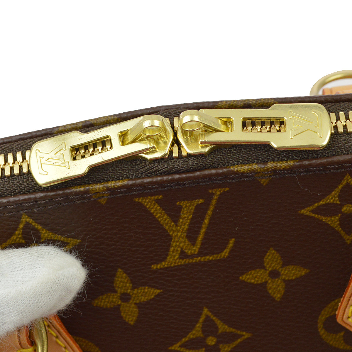Louis Vuitton Monogram Alma Handbag in Brown