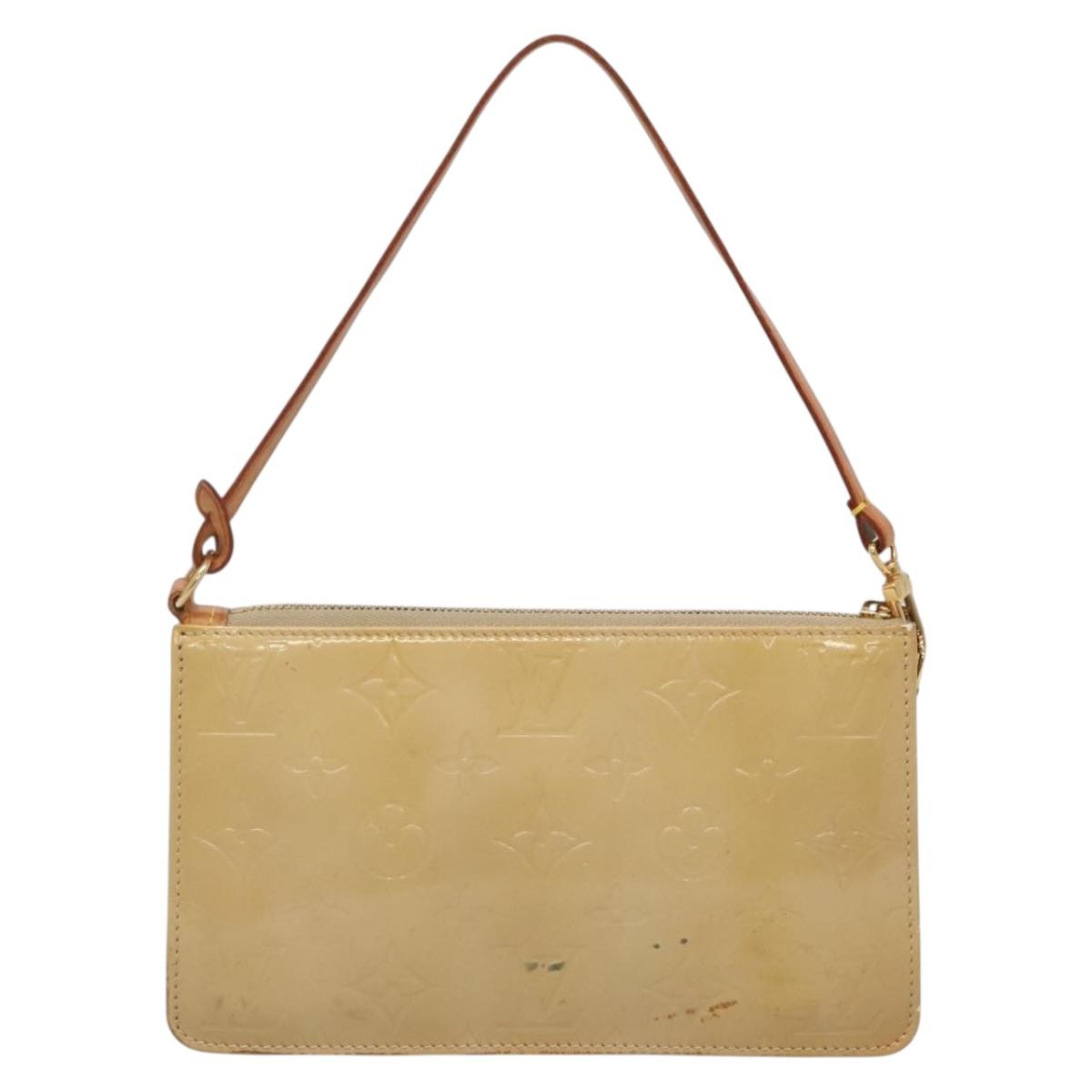 Louis Vuitton Lexington Beige Patent Leather Clutch Bag ( ) | Studio Nafay