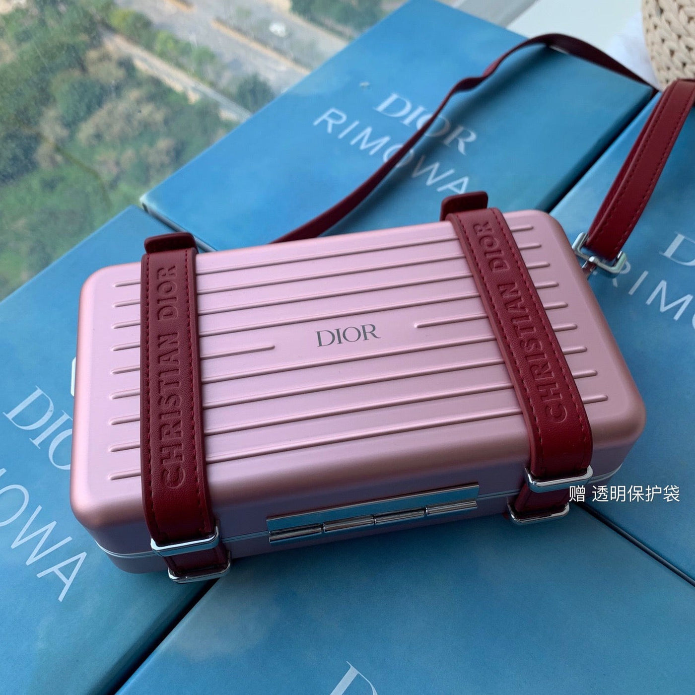 RIMOWA 20 CASE BAG IN LIGHT PINK ALUMINUM MAGNESIUM | Studio Nafay