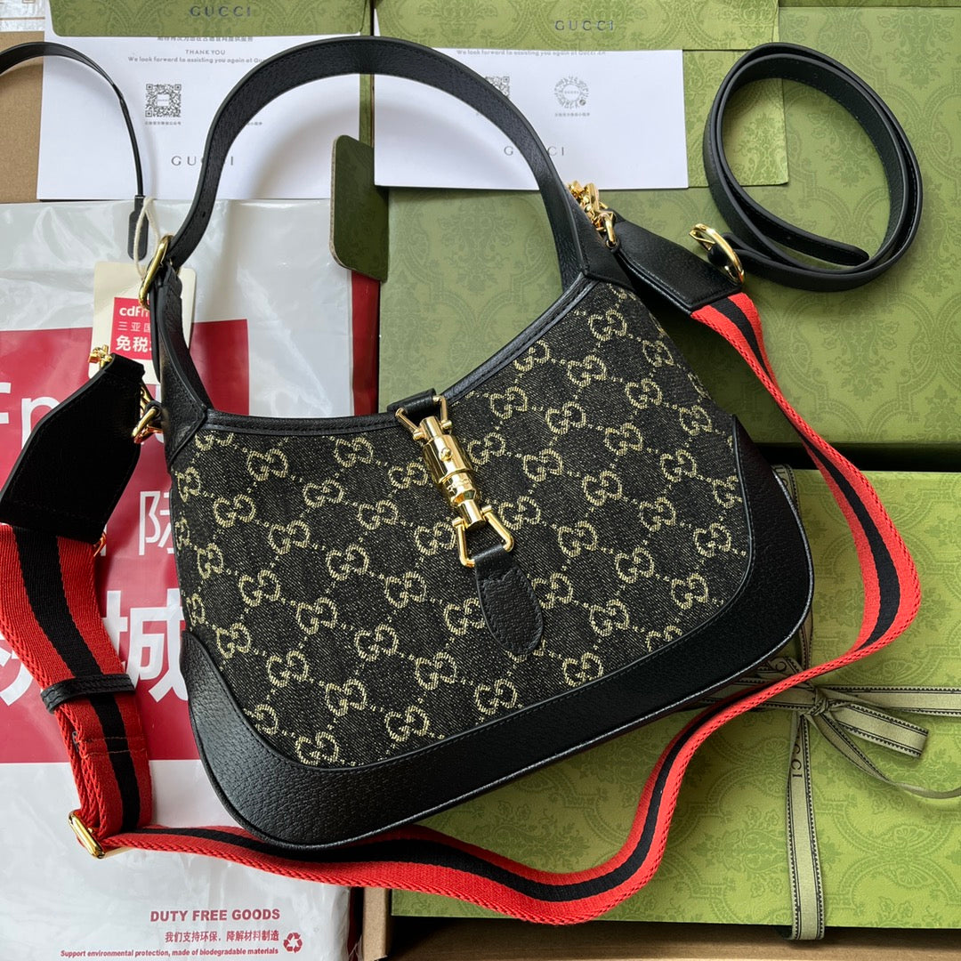 JACKIE SHOULDER BAG 28 IN BLACK YELLOW DENIM AND BLACK CALFSKIN TRIM GOLD HARDWARE | Studio Nafay