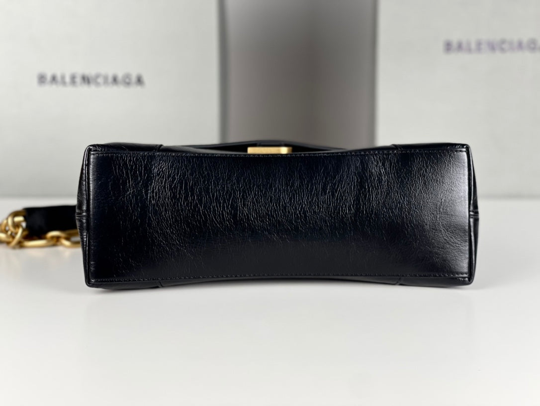 DOWNTOWN SHOULDER BAG 29 IN BLACK WAXED SHEEPSKIN GOLD HARDWARE | Studio Nafay