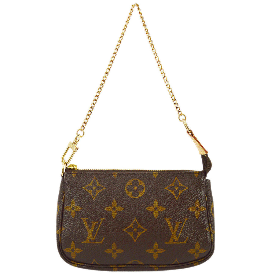 Louis Vuitton Monogram Mini Pochette Accessoires Handbag in Brown