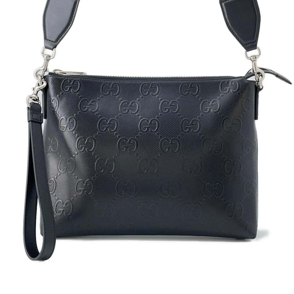 GUCCI GG-embossed messenger bag Black 696009 Leather | Studio Nafay