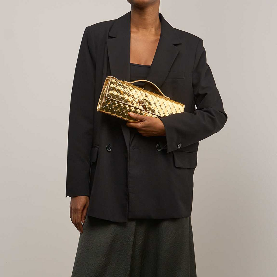 Andiamo Intrecciato Metallic Leather Long Clutch In Gold Designer Clutch for Women | Studio Nafay