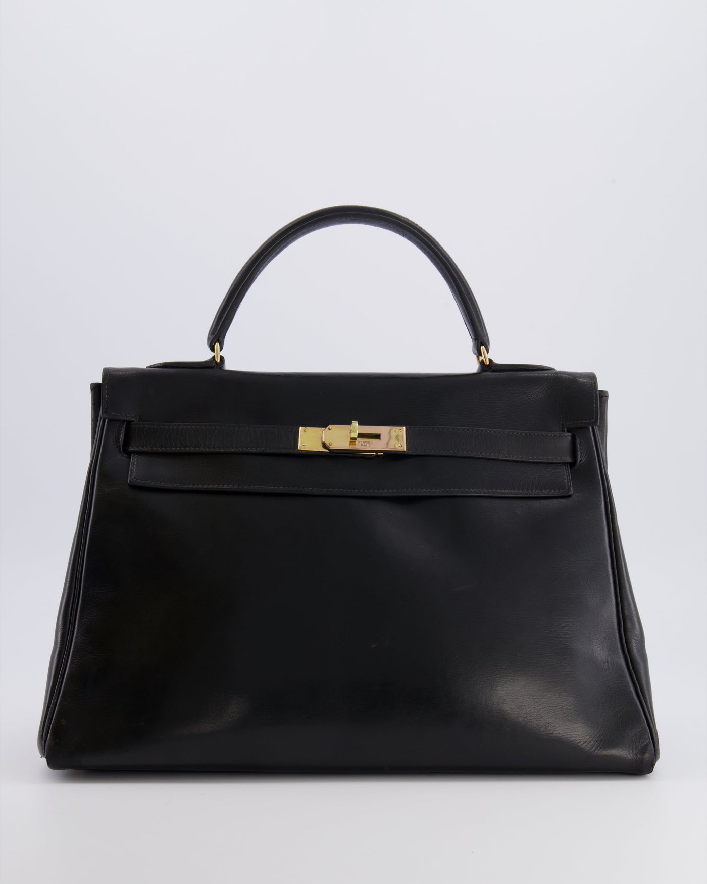 Hermes Kelly 32 Retourne Bag in Black Calfskin Box Leather with Gold Hardware | Studio Nafay