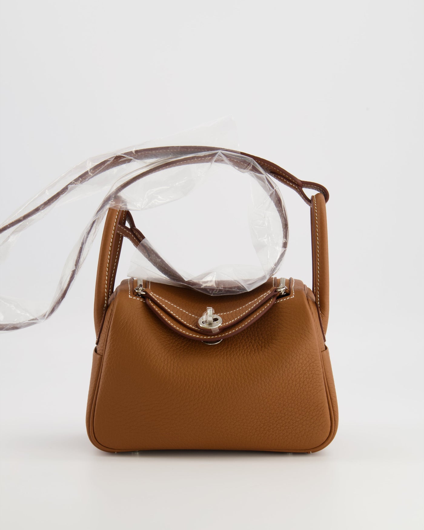 Hermes Mini Lindy Bag in Gold Taurillon Clemence Leather with Palladium Hardware | Studio Nafay