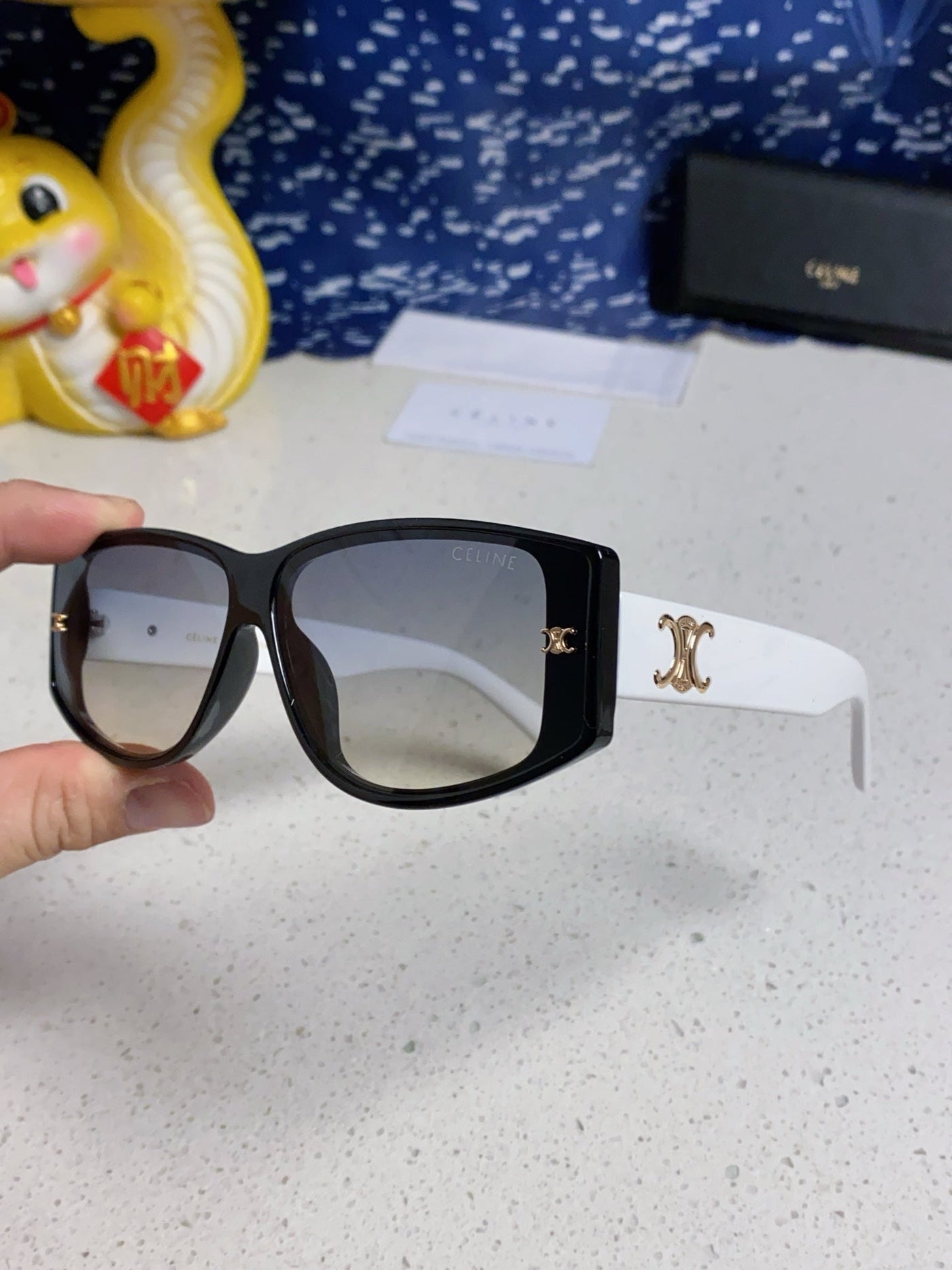 TRIOMPHE SUNGLASS 566216 IN BLACK AND WHITE ACETATE - Product Image 2